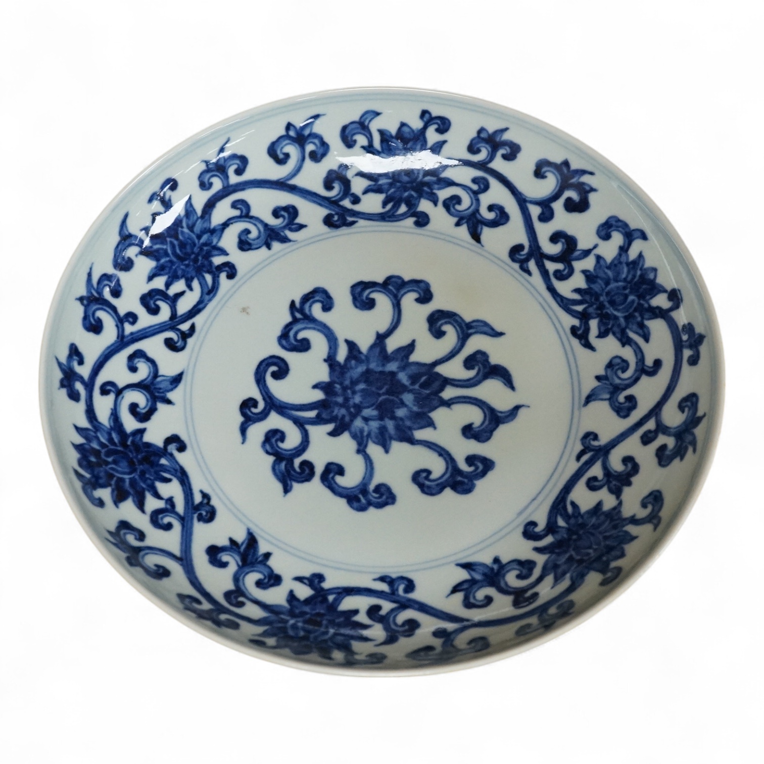 A Chinese blue and white dish, Xuande mark but later, 22cm in diameter